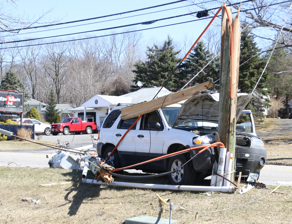 Vehicle slams into pole on Route 202