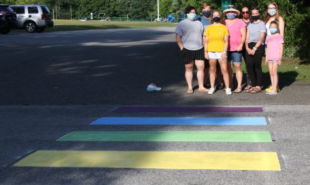 Crosswalk takes on colors of a rainbow