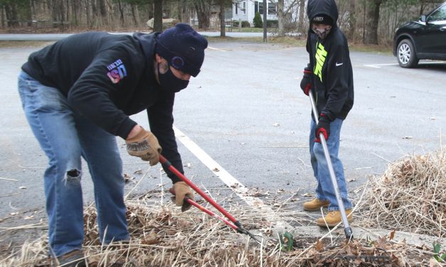 Volunteers touch up center’s grounds
