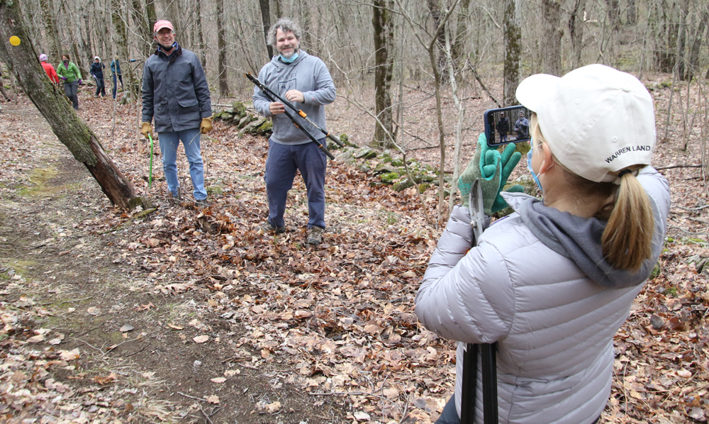 Volunteers clear trail in Warren preserve