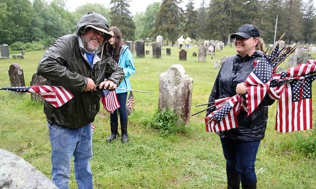Planting new flags a Memorial Day tradition