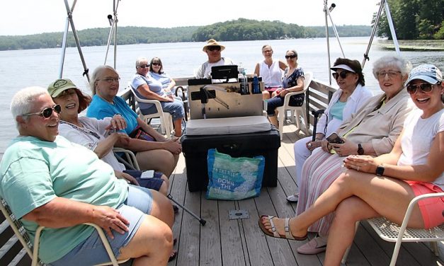 Senior citizens enjoy picnic and cruise