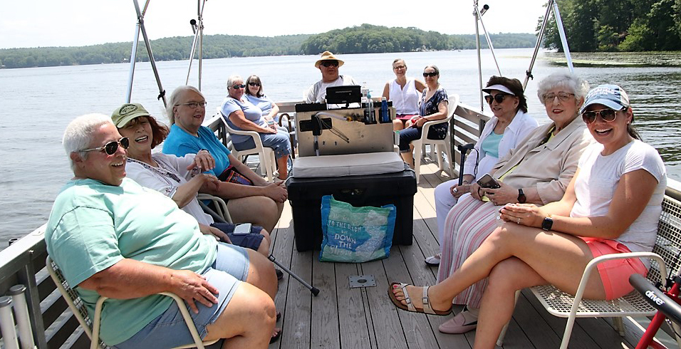 Senior citizens enjoy picnic and cruise