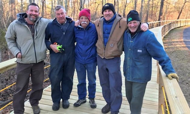 Job well done: Volunteers finish boardwalk