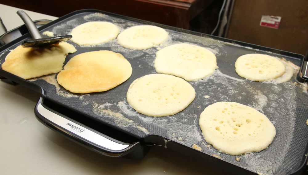 Pancakes on dinner menu at Milton church