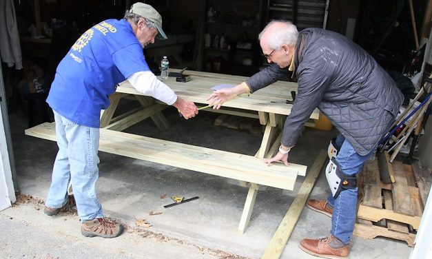 One picnic table down, one more to go