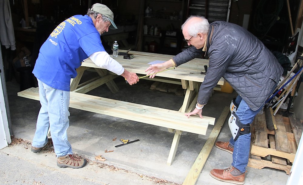 One picnic table down, one more to go