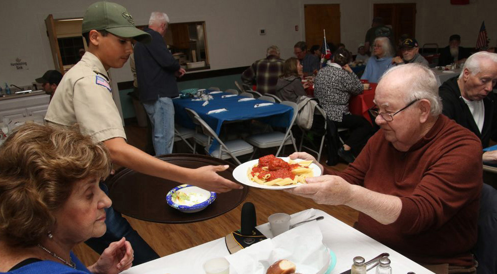 Goshen Scouts treat veterans to supper