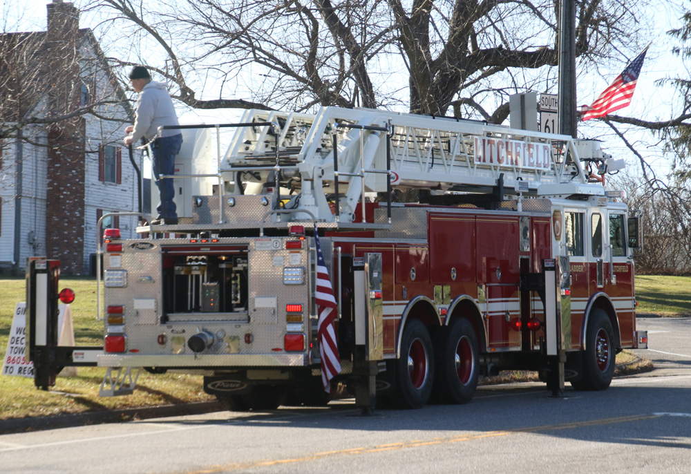 Chief borrows ladder truck to hang lights