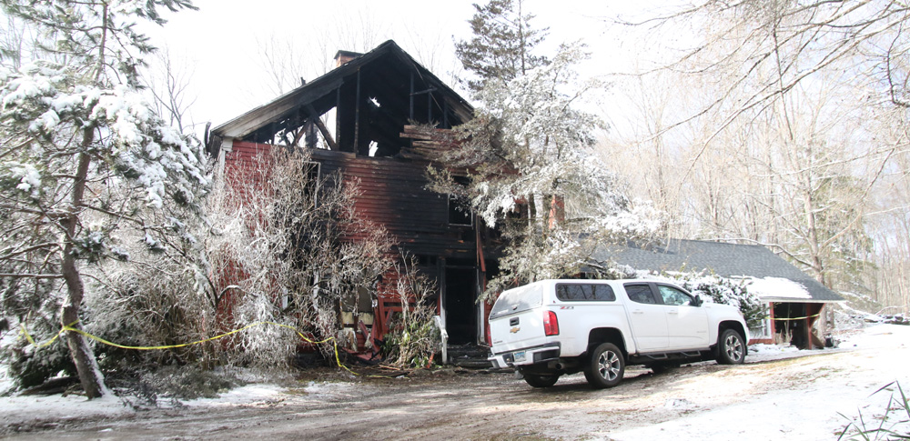 Raging fire consumes house in Warren
