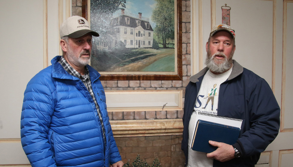 Family roots: Brothers tour historic home
