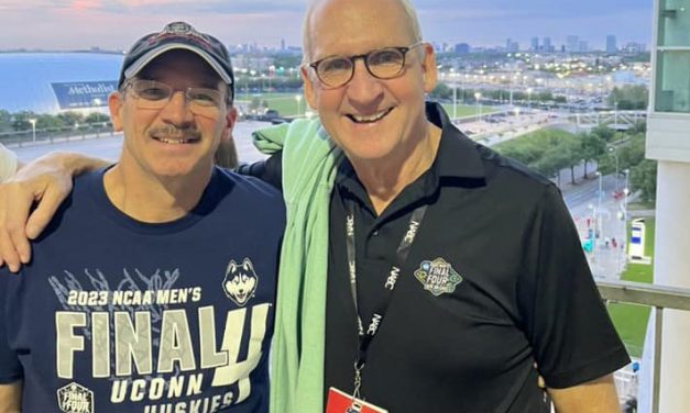 Local fans supporting Huskies in Houston