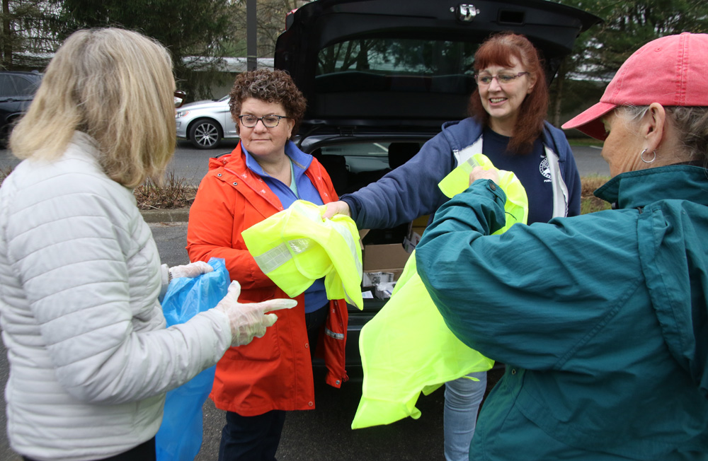 Earth day cleanup scenes in Litchfield