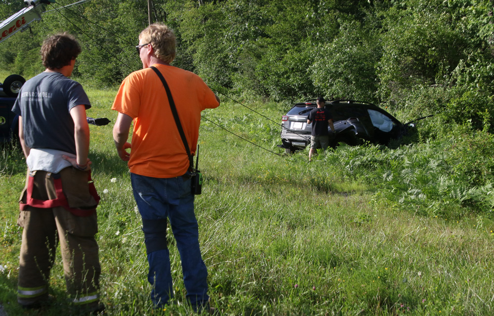 Car veers into woods along Goshen Road