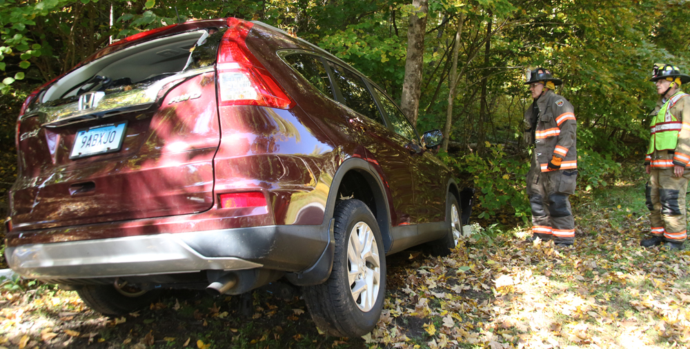 SUV leaves Clark Road and collides with tree