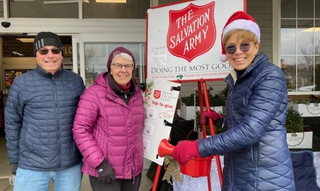 Volunteers ringing bell for Salvation Army