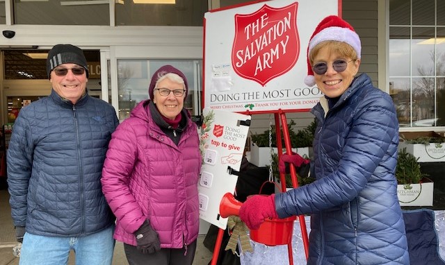 Volunteers ringing bell for Salvation Army