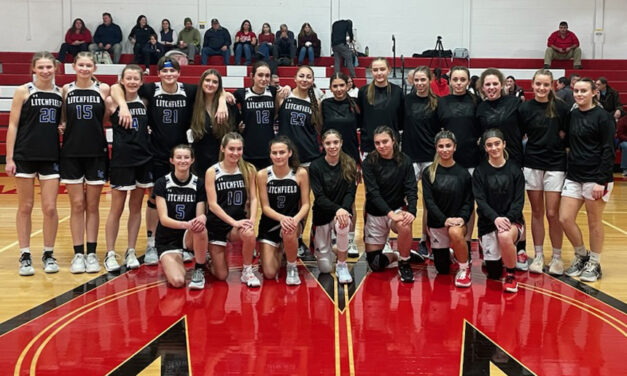 Hoop teams play historic doubleheader