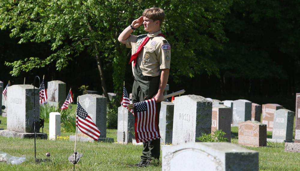 Placing new flags a Memorial Day tradition