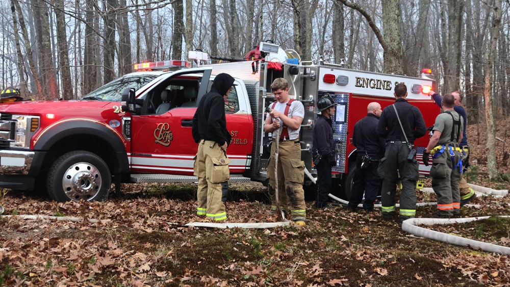 Local firefighters help quell brush fire