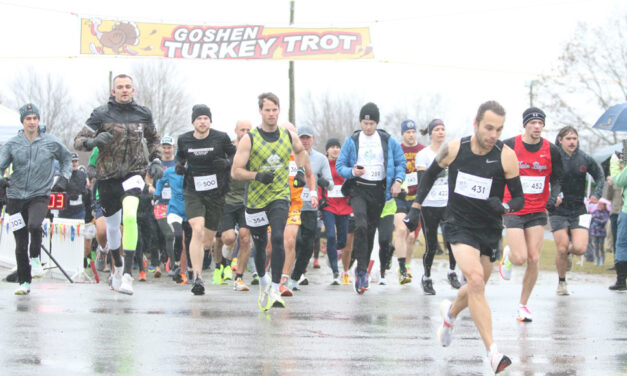 Runners brave a cold rain in Turkey Trot