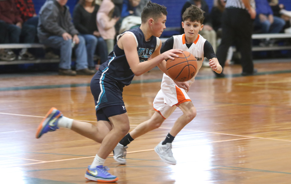 Hills hoop teams compete in tournament