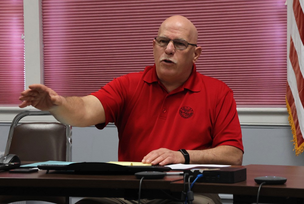 Officials to seek meeting on school debt