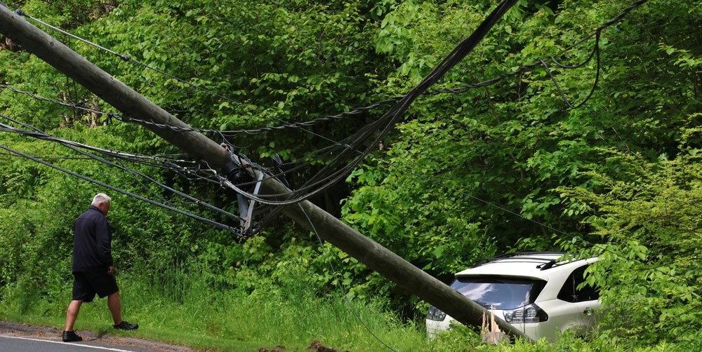 Vehicle takes down pole on Norfolk Road