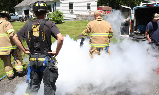 Firefighters snuff out fire in tool bucket