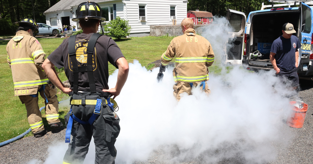 Firefighters snuff out fire in tool bucket