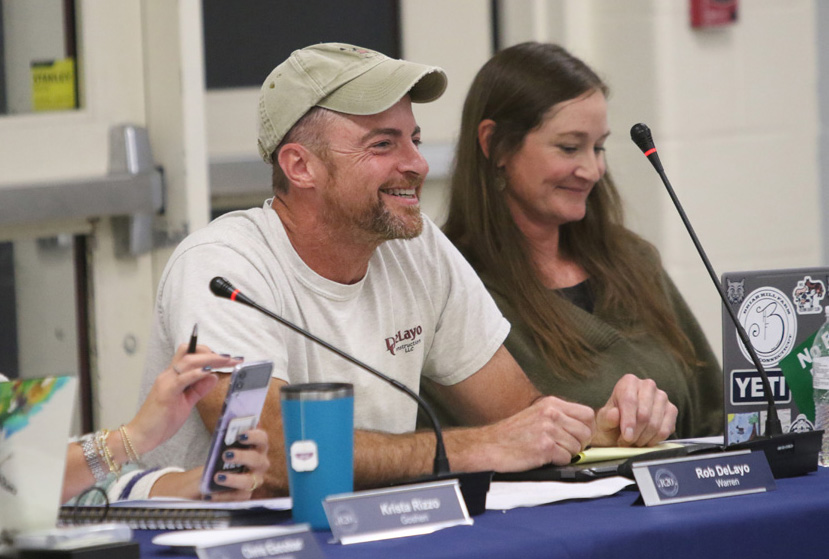 Warren returns DeLayo to Region 20 board