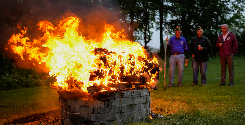 Post 27 marks Flag Day with burning service