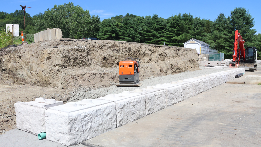 Retaining wall going up at Morris facility