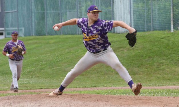 Trojans strengthen grip on first place
