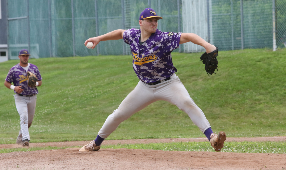 Trojans strengthen grip on first place