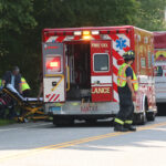 Motorcycle and car involved in crash on 202