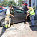 Car jumps curb, strikes West Street building