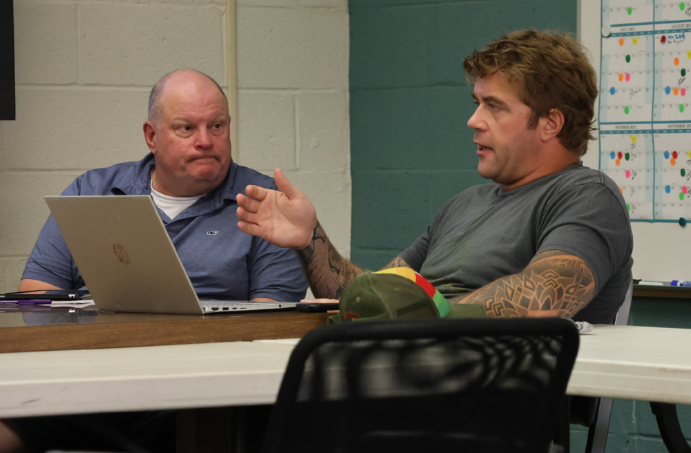 Board resumes dialogue on cop coverage