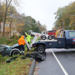 Car leaves Torrington Road and strikes tree