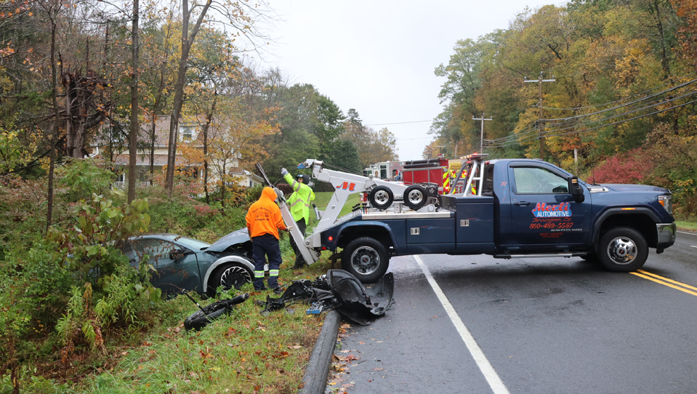 Car leaves Torrington Road and strikes tree