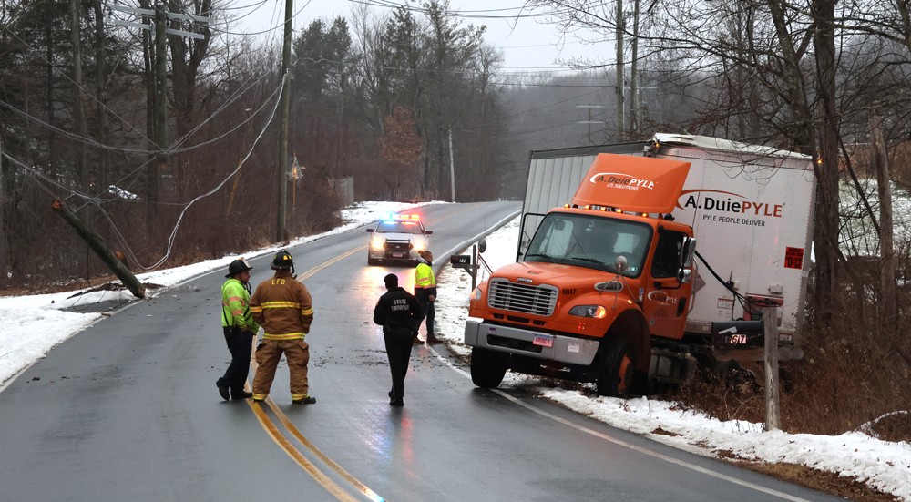 Tractor trailer truck runs off Fern Avenue