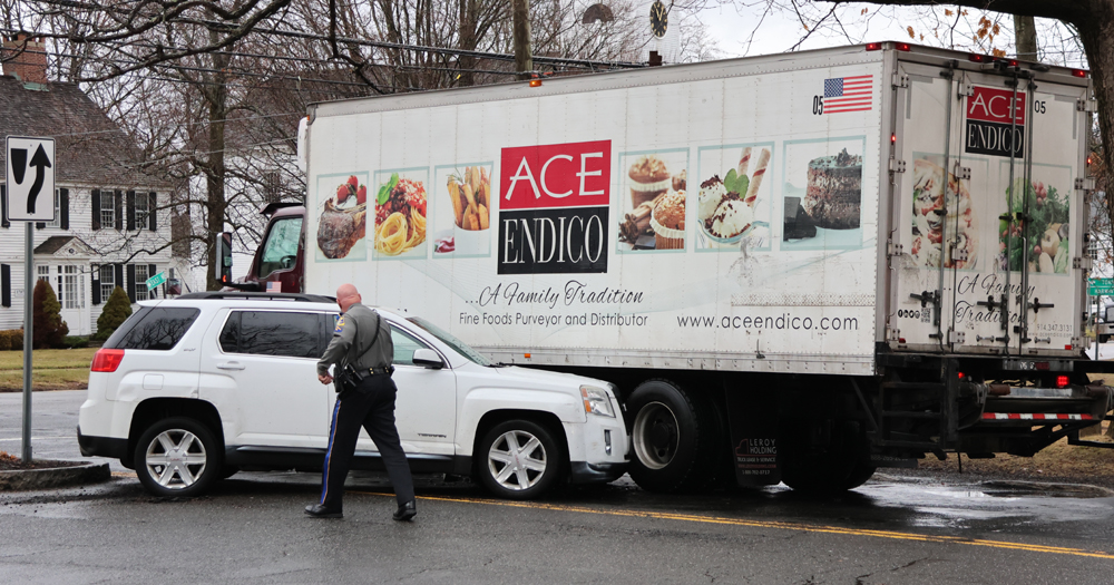 Truck struck in center of town accident