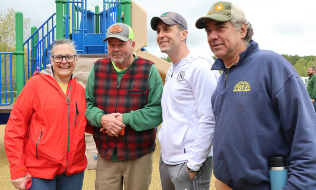 Officials celebrate field’s new playground