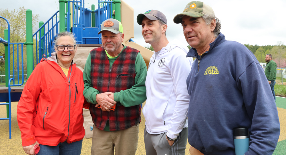 Officials celebrate field’s new playground