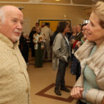 Paul Winter greets benefit concert guests