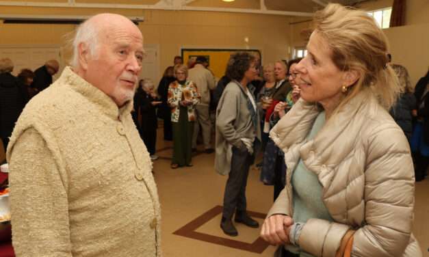 Paul Winter greets benefit concert guests