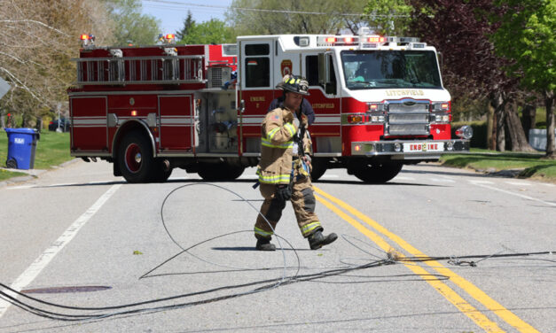 Truck pulls down wires on North Street