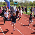 PTO fundraiser ends with fun run on track
