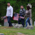 Flags placed, Sunday parades canceled