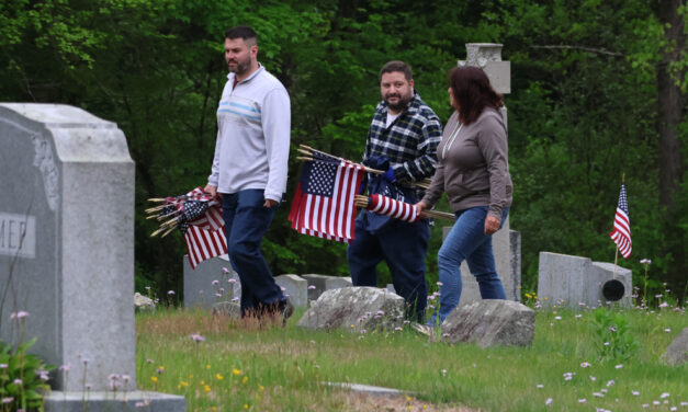 Flags placed, Sunday parades canceled